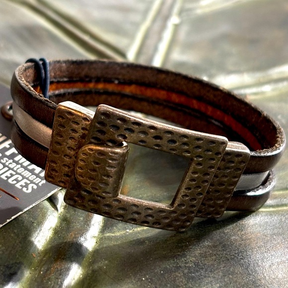 Brown SilverFlat Leather (5MM) Triple Strand
Bracelet with Bronze Toggle Clasp - Picture 5 of 6